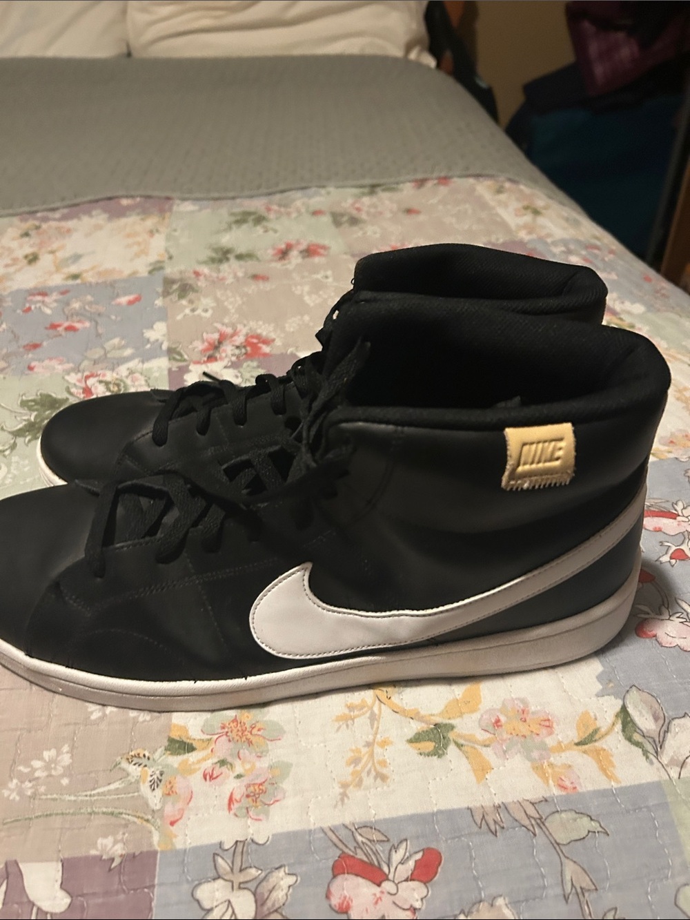 Nike Men’s Black High-Top Sneakers with White Swoosh